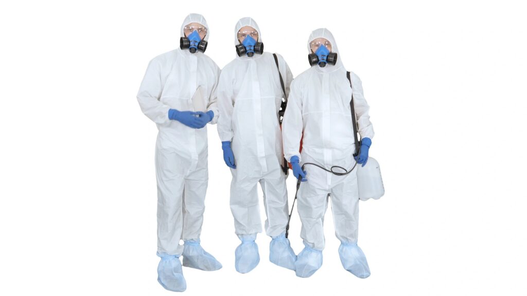 Three disinfectors walk in holding the disinfectant in their hands on white background